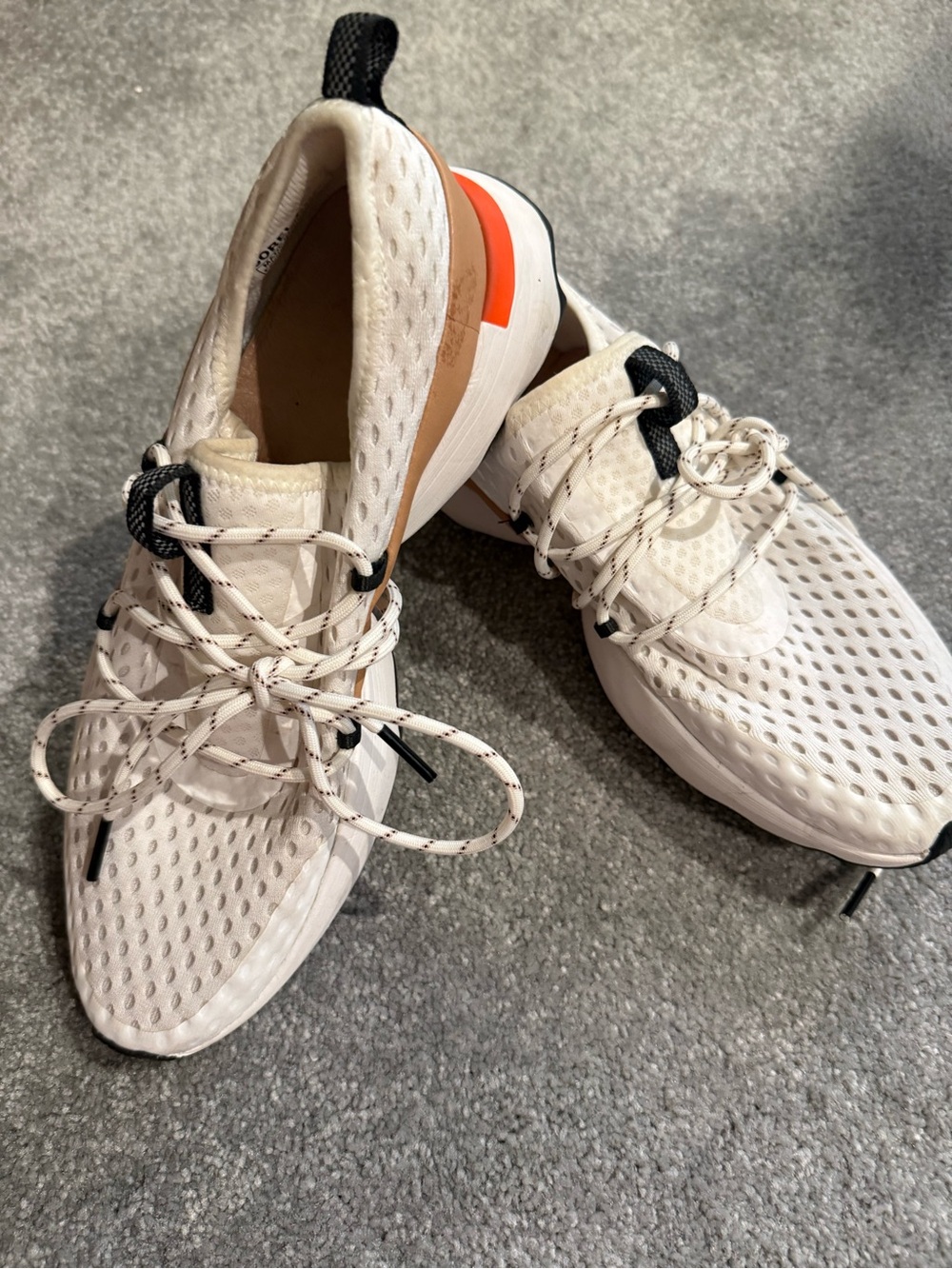 Sorel Kinetic Women’s Knit Sneakers with Orange Heel Accent. Wrap around laces.
